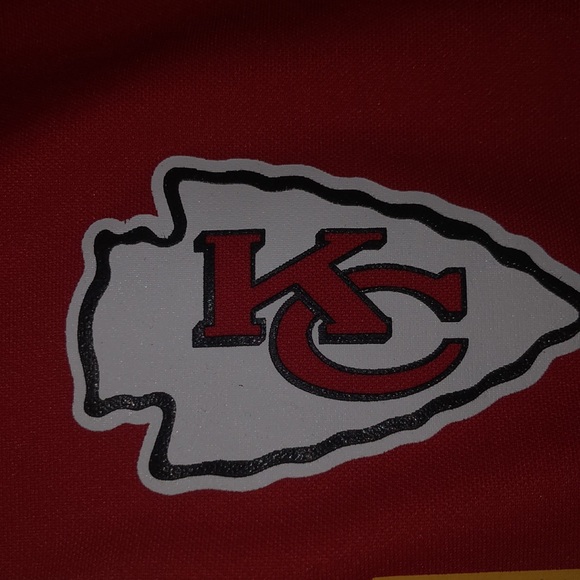 I am selling a nfl jersey for kids size 10-12 it red and white and yellow - Picture 2 of 4